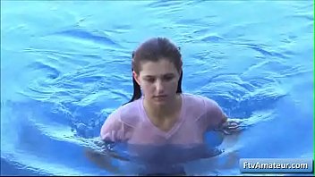 Sexy teen Fiona wearing a wet t-shirt and playing with her perky nipples