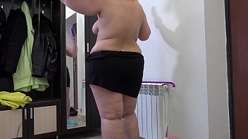 Beautiful BBW in everyday life. Big ass and fat legs under a short skirt. Homemade fetish.
